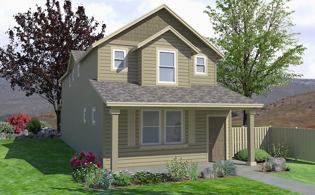 5803 Horn Rd, Missoula, MT 59808 - view of front of house with a front yard, fence, and roof with shingles