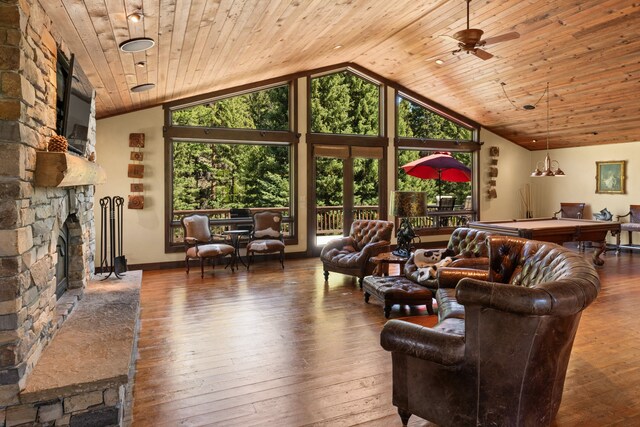 living room with pool table, a fireplace, high vaulted ceiling, dark hardwood / wood-style flooring, and wooden ceiling