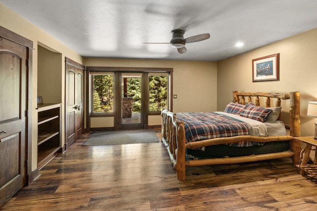 bedroom with ceiling fan, access to outside, and dark hardwood / wood-style flooring