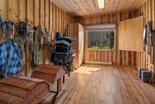 view of stable featuring baseboard heating