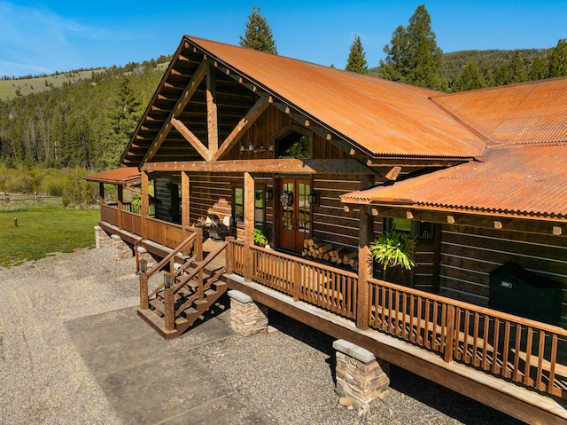 view of log-style house