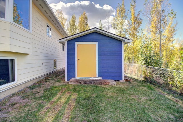 view of outdoor structure with a yard