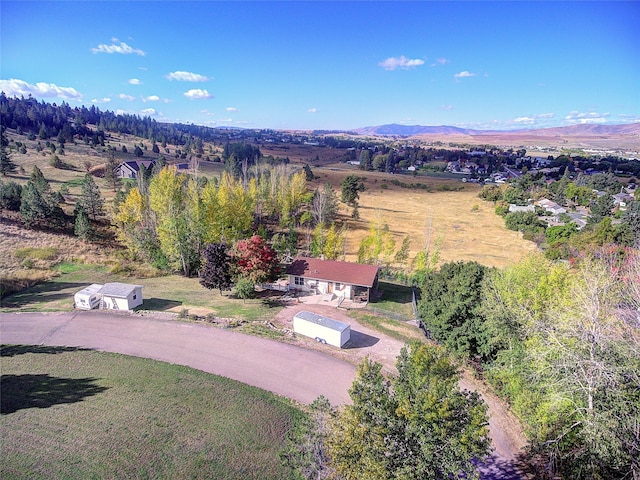 drone / aerial view featuring a mountain view