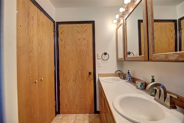 bathroom featuring vanity and tile patterned flooring