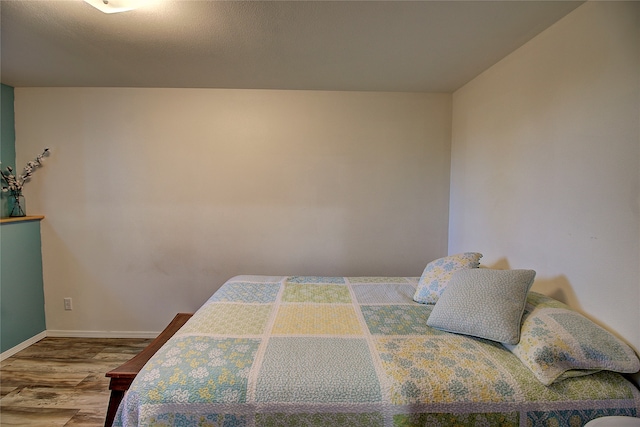 bedroom featuring hardwood / wood-style floors