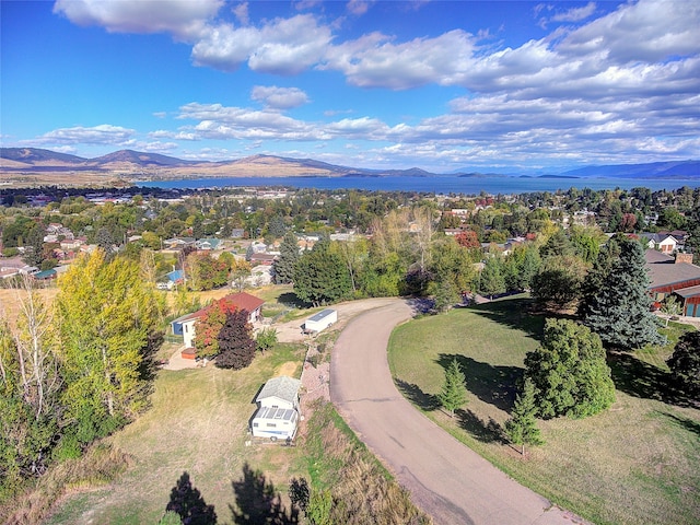 drone / aerial view featuring a mountain view