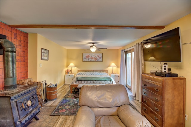 bedroom with light hardwood / wood-style floors and ceiling fan