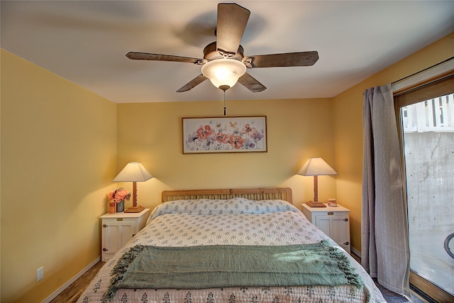 bedroom featuring ceiling fan and hardwood / wood-style floors