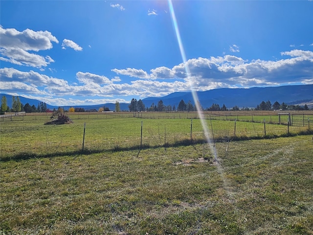 property view of mountains featuring a rural view