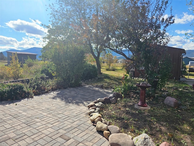 view of patio with a mountain view