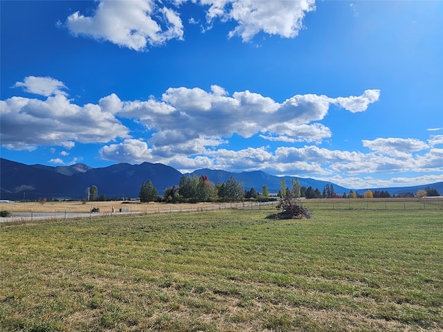 mountain view featuring a rural view