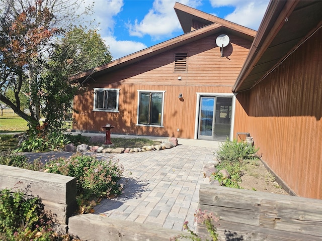 rear view of property with a patio area