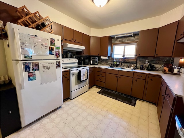 kitchen featuring white appliances, dark brown cabinets, sink, and tasteful backsplash