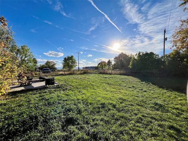 view of yard with a rural view