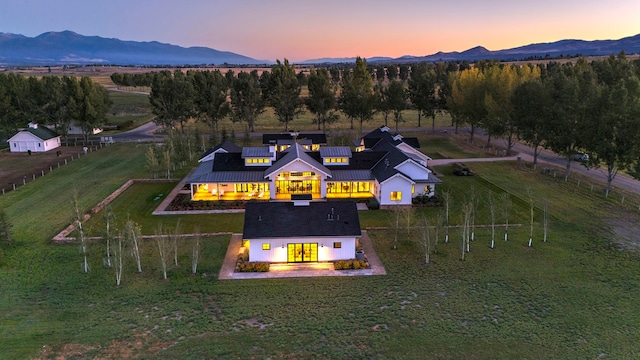 aerial view at dusk with a mountain view