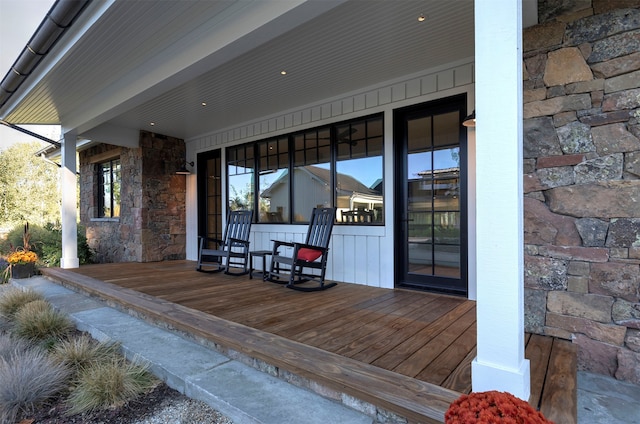 wooden deck featuring a porch