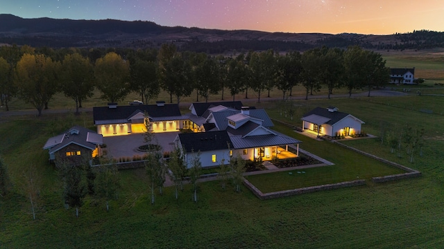 aerial view at dusk with a mountain view