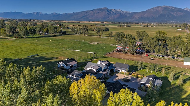 bird's eye view with a rural view and a mountain view