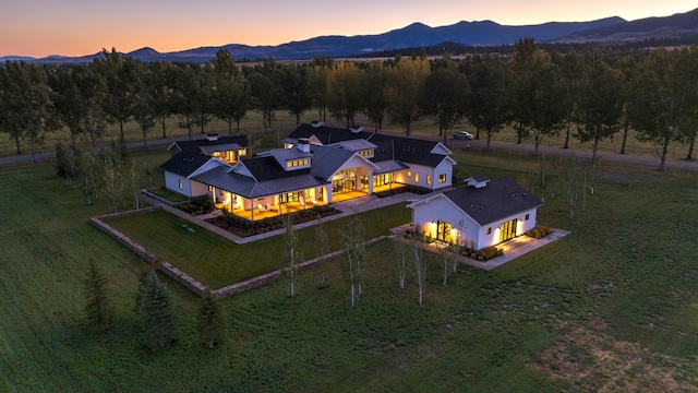 aerial view at dusk with a mountain view