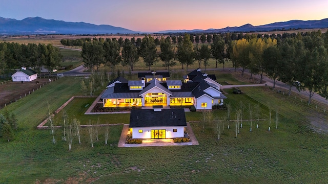 aerial view at dusk with a mountain view