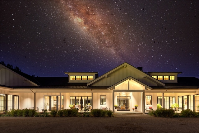 view of back house at night