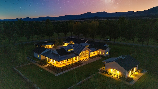 aerial view at dusk with a mountain view