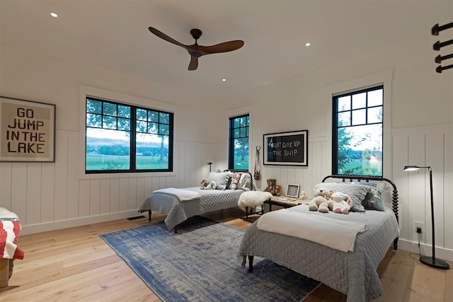 bedroom featuring ceiling fan and light wood-type flooring