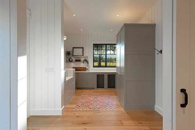 kitchen featuring light wood-type flooring and gray cabinetry