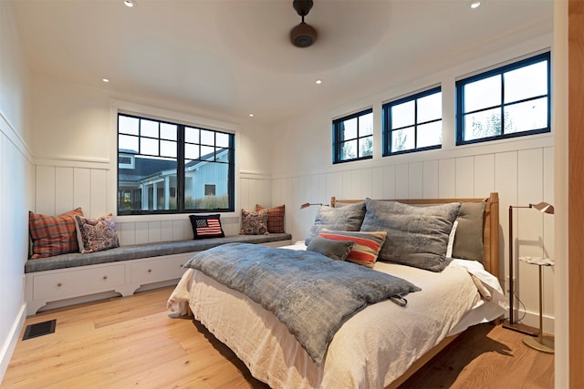 bedroom featuring light wood-type flooring and ceiling fan