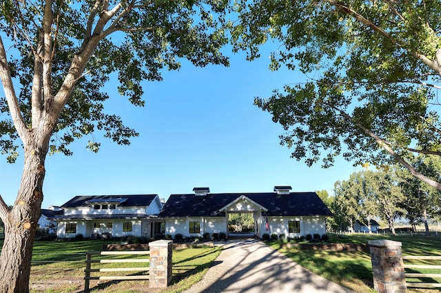 view of front of house with a front lawn