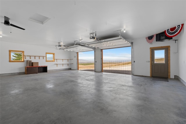 53 Skyview Ln, Townsend, MT 59644 - garage featuring a garage door opener and a heating unit