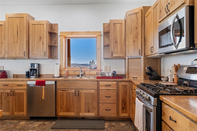 53 Skyview Ln, Townsend, MT 59644 - kitchen featuring appliances with stainless steel finishes, open shelves, and stone finish floors