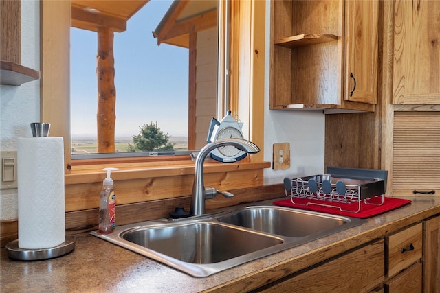 53 Skyview Ln, Townsend, MT 59644 - kitchen view of a sink and brown cabinets