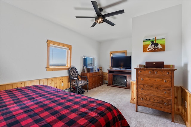 53 Skyview Ln, Townsend, MT 59644 - bedroom with light carpet, a ceiling fan, and a wainscoted wall