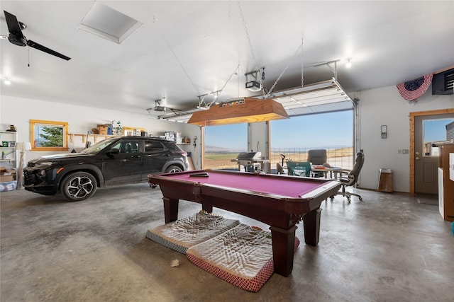 53 Skyview Ln, Townsend, MT 59644 - playroom with concrete flooring, healthy amount of natural light, a garage, and billiards table