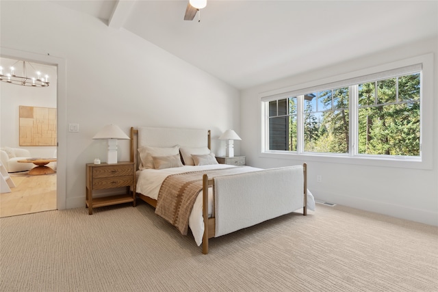 bedroom with carpet, ceiling fan with notable chandelier, lofted ceiling with beams, and multiple windows