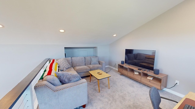 living room with lofted ceiling and light carpet