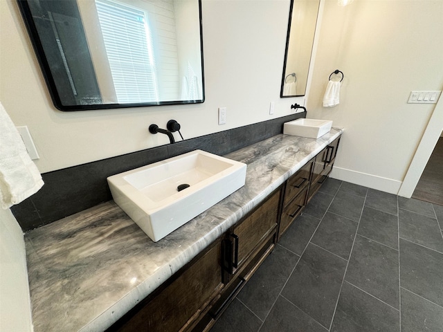 bathroom featuring vanity and tile patterned floors