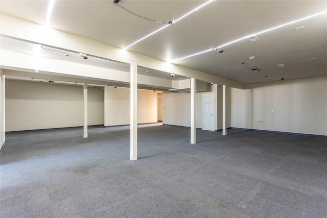 finished basement with carpet floors and baseboards