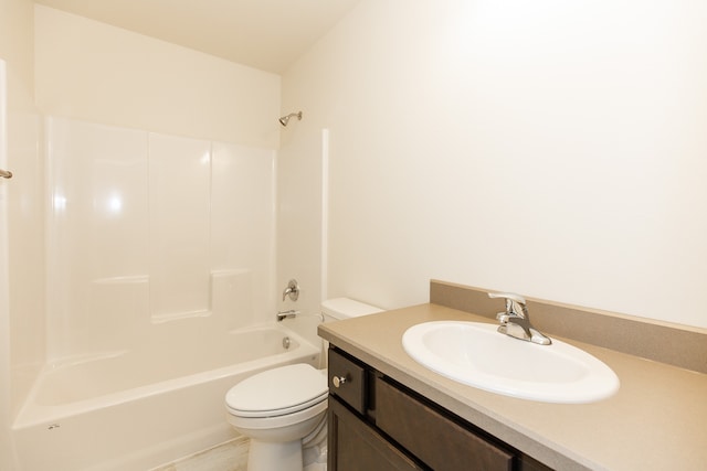 full bathroom with vanity, bathing tub / shower combination, and toilet