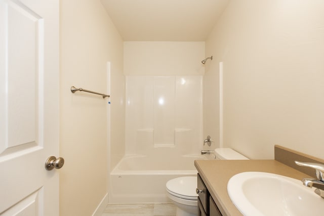 full bathroom with  shower combination, toilet, and vanity