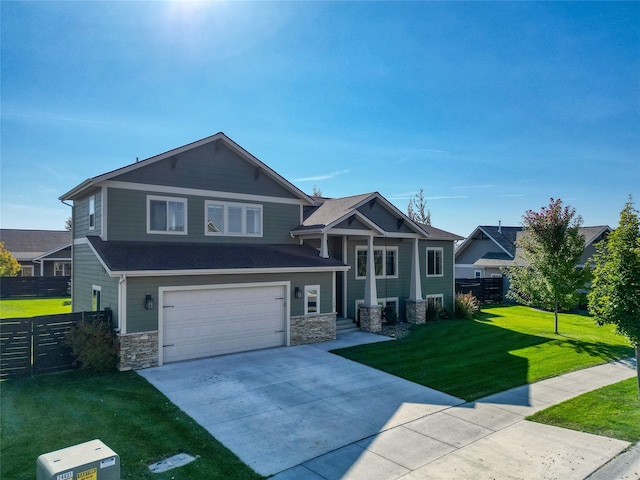 craftsman-style home with a garage and a front yard