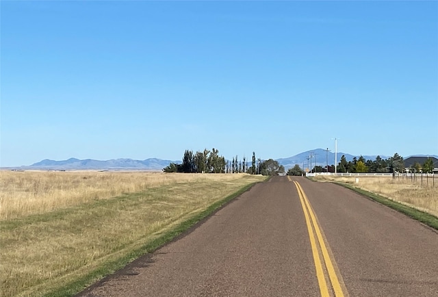 view of street featuring a mountain view and a rural view