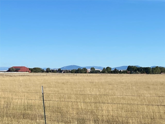 property view of mountains featuring a rural view