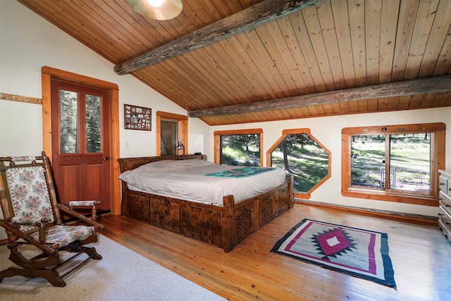 bedroom with wood ceiling, multiple windows, and hardwood / wood-style flooring