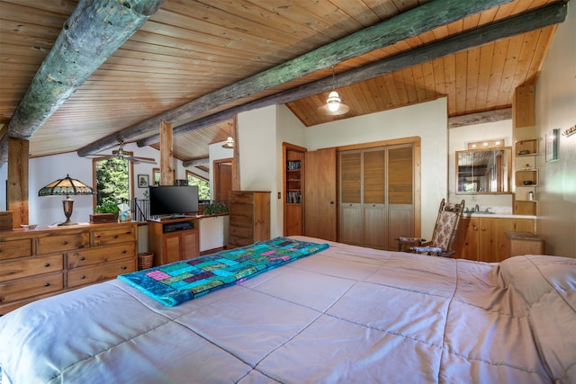 bedroom featuring wood ceiling, a closet, and lofted ceiling with beams