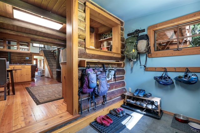 interior space with wooden ceiling and hardwood / wood-style flooring