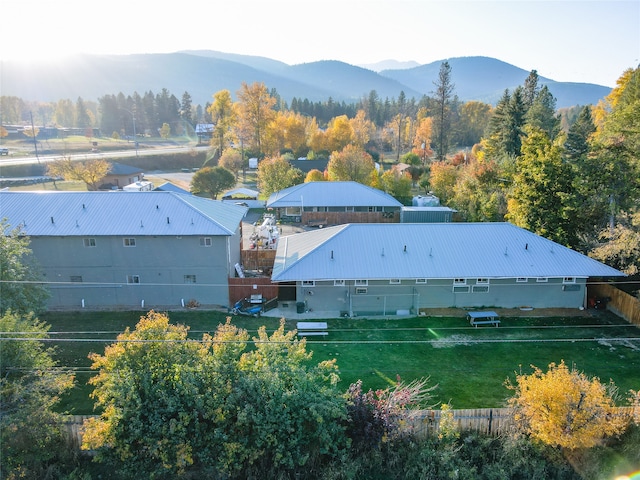 birds eye view of property with a mountain view