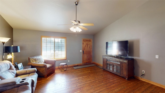 living room with lofted ceiling, dark hardwood / wood-style floors, and ceiling fan