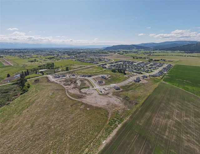 bird's eye view featuring a mountain view and a rural view